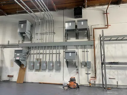 Licensed commercial electrician installing electrical systems for a business in Hawke's Bay, New Zealand