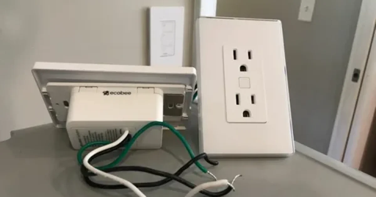 Professional electrician installing smart home wiring and structured cabling in a modern New Zealand home.